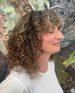 Wavy Wolf Cut Hairstyles with Bangs